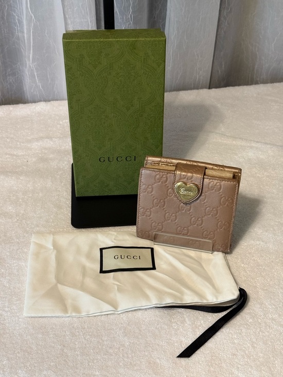 Gucci Handbags - Gucci Metallic Rose Gold GG Bifold Wallet